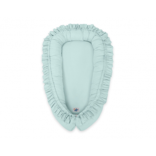 Babynest mit Rüsche - minze